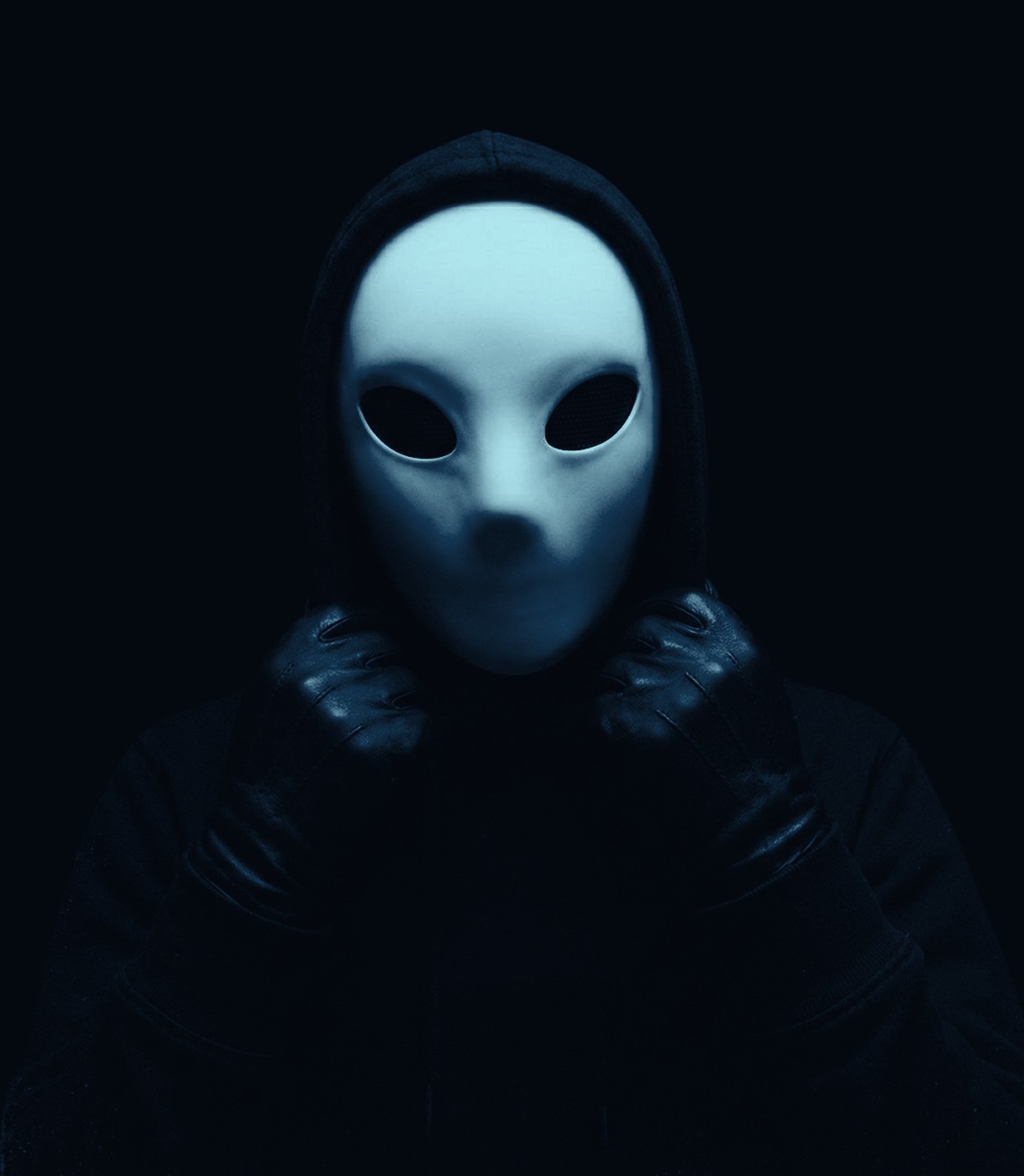 Lemon in a black hood and white mask